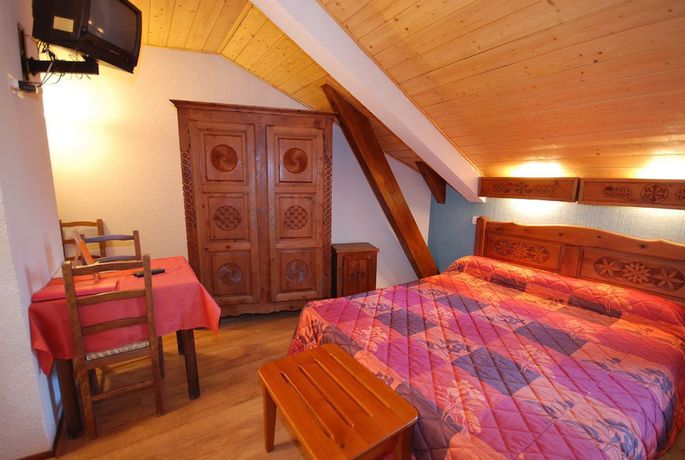 Imagen de la habitación del Hotel Hôtel l\'Aiglière. Foto 11