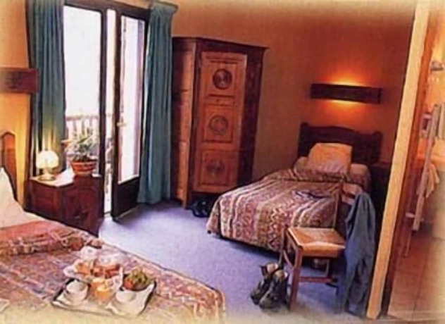 Imagen de la habitación del Hotel Hôtel l\'Aiglière. Foto 15