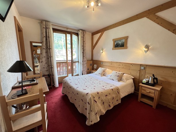 Imagen de la habitación del Hotel Hôtel l\'Igloo. Foto 8