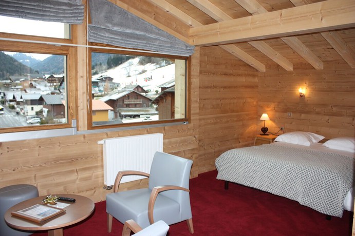 Imagen de la habitación del Hotel Hôtel l\'Igloo. Foto 15