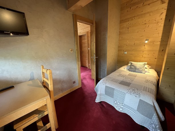 Imagen de la habitación del Hotel Hôtel l\'Igloo. Foto 19