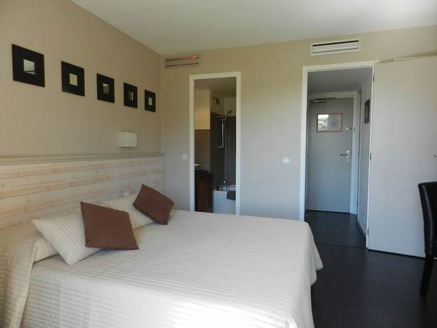 Imagen de la habitación del Hotel H&ocirc;tel l\'Orangeraie. Foto 11