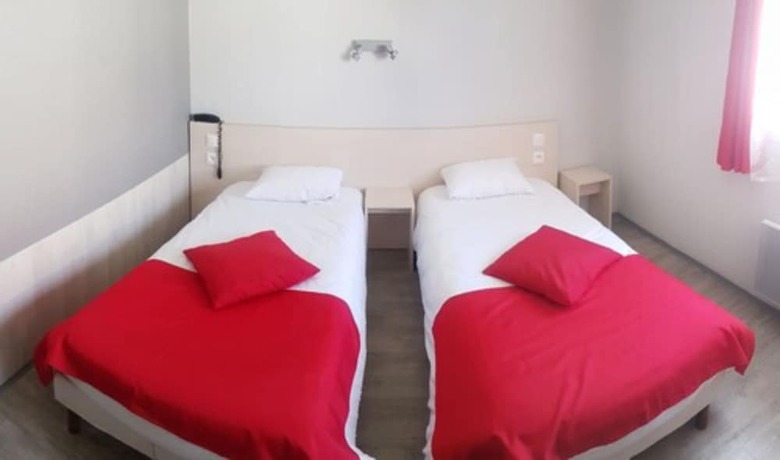 Imagen de la habitación del Hotel H&ocirc;tel la B&eacute;rang&egrave;re, Perouges. Foto 5