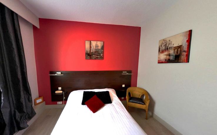 Imagen de la habitación del Hotel Hôtel la Croix Couverte. Foto 11