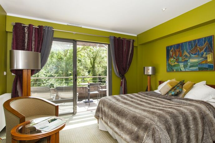 Imagen de la habitación del Hotel Hôtel la Source Bleue. Foto 15
