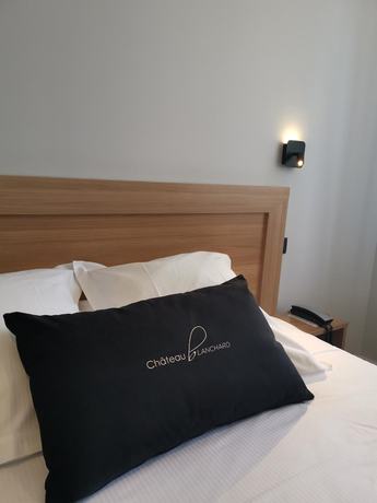 Imagen de la habitación del Hotel H&ocirc;tel le Ch&acirc;teau Blanchard. Foto 12