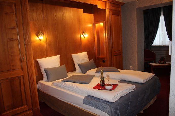 Imagen de la habitación del Hotel Hôtel le Mittelwihr. Foto 15