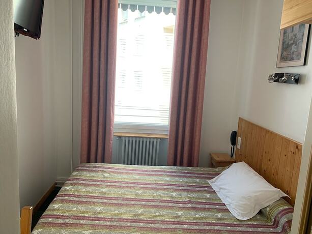 Imagen de la habitación del Hotel H&ocirc;tel le National, SAINT ETIENNE. Foto 5