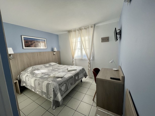 Imagen de la habitación del Hotel H&ocirc;tel les Arcades, Saintes Maries de la Mer. Foto 6