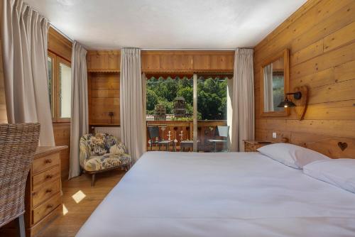 Imagen de la habitación del Hotel H&ocirc;tel les Bains. Foto 14