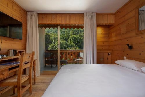 Imagen de la habitación del Hotel H&ocirc;tel les Bains. Foto 15