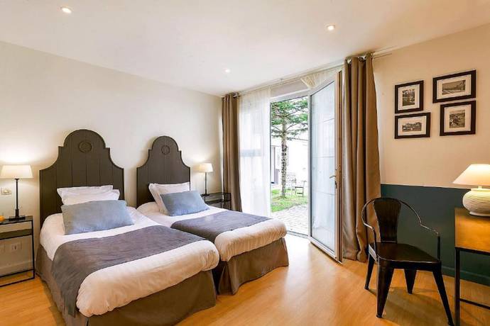 Imagen de la habitación del Hotel Hôtel les Embruns. Foto 17