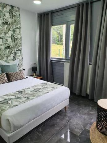 Imagen de la habitación del Hotel H&ocirc;tel parc & spa Les cigognes. Foto 9