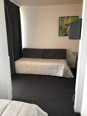 Imagen de la habitación del Hotel H&ocirc;tel-R&eacute;sidence les Aiguades. Foto 14