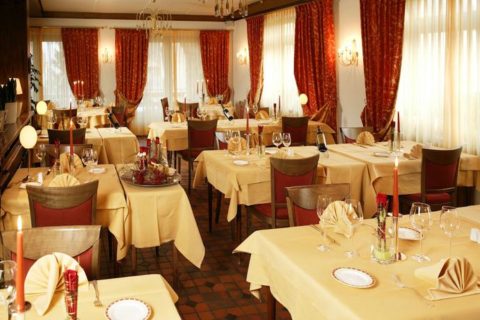 Imagen del bar/restaurante del Hotel H&ocirc;tel-Restaurant DAHM. Foto 7