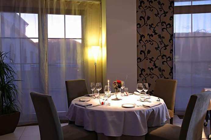 Imagen del bar/restaurante del Hotel H&ocirc;tel-Restaurant DAHM. Foto 8