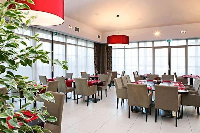 Imagen del bar/restaurante del Hotel H&ocirc;tel-Restaurant DAHM. Foto 9