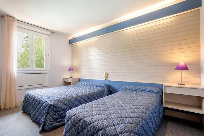 Imagen de la habitación del Hotel H&ocirc;tel-Restaurant La Cr&egrave;che et sa piscine int&eacute;rieure. Foto 8