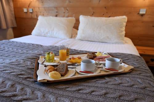 Imagen de la habitación del Hotel H&ocirc;tel-chalet De Tradition La Chemenaz. Foto 8