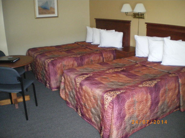 Imagen de la habitación del Hotel H&ocirc;tel-motel Manoir De Perc&eacute;. Foto 6