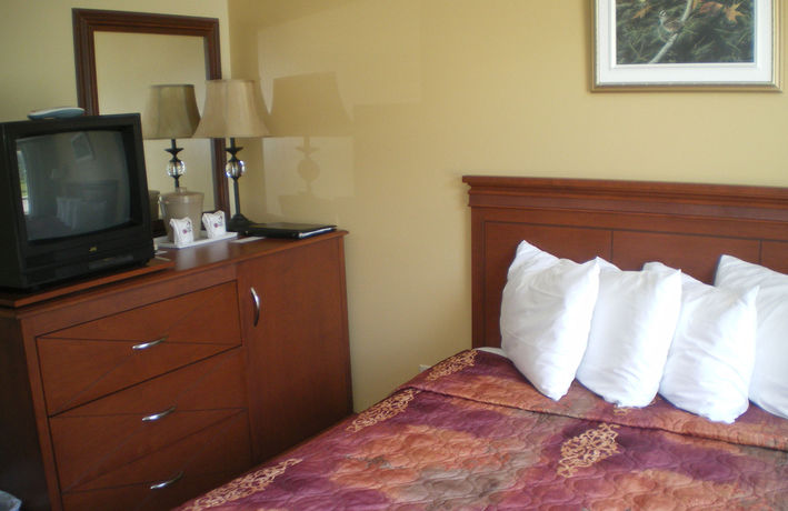 Imagen de la habitación del Hotel H&ocirc;tel-motel Manoir De Perc&eacute;. Foto 9