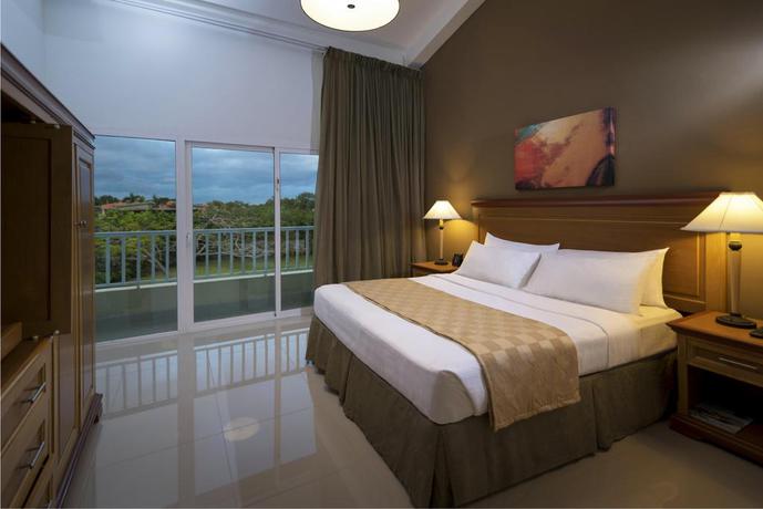 Imagen de la habitación del Hotel Hodelpa Garden Suites Golf and Convention Center. Foto 6
