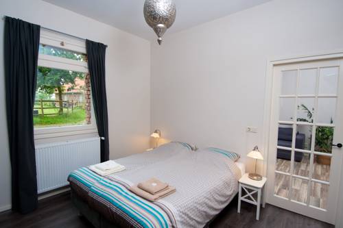 Imagen de la habitación del Hotel Hoeve De Binnenplaets. Foto 8
