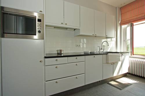 Imagen de la habitación del Hotel Hoeve Hazegras. Foto 15