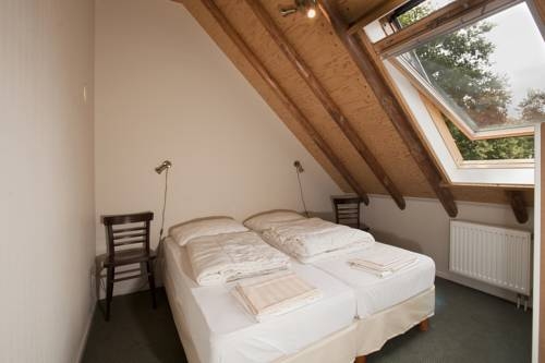 Imagen de la habitación del Hotel Hoeve Springendal. Foto 4