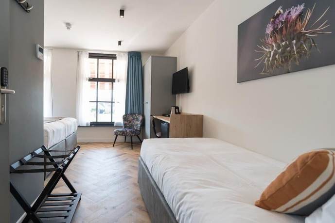 Imagen de la habitación del Hotel Hof van Holland. Foto 12