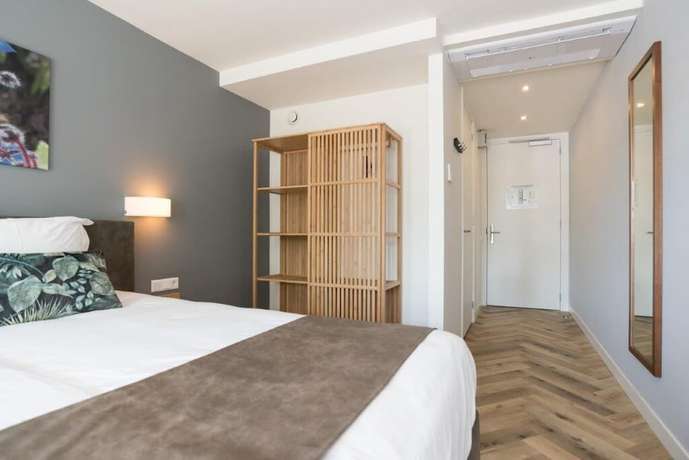 Imagen de la habitación del Hotel Hof van Holland. Foto 17