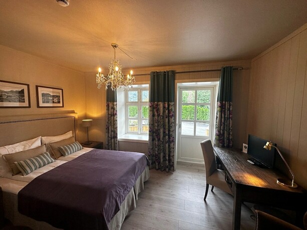 Imagen de la habitación del Hotel Hofslund Fjord. Foto 18