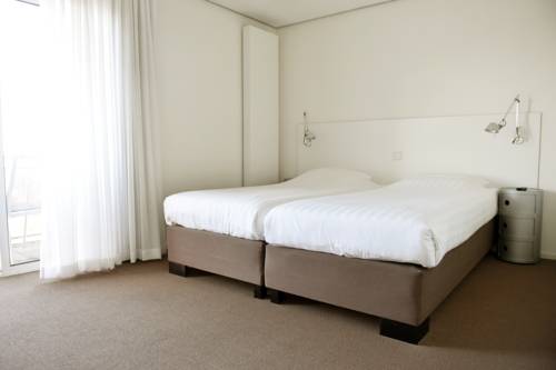 Imagen de la habitación del Hotel Hogerhuys - Adults Only. Foto 8