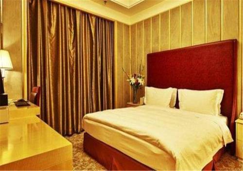 Imagen de la habitación del Hotel Hohhot Header. Foto 6