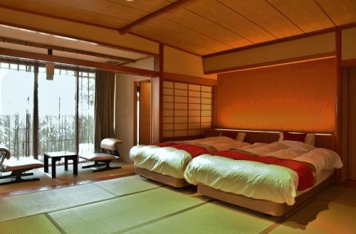 Imagen de la habitación del Hotel Hohoemino Kuyufu Tsuruya. Foto 9