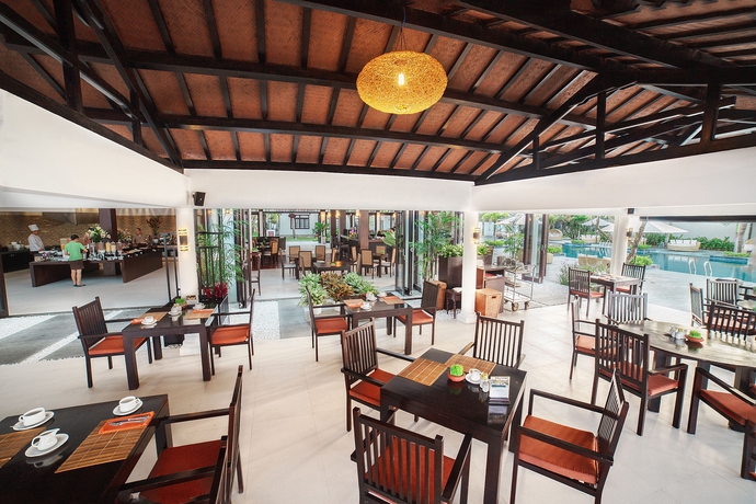 Imagen del bar/restaurante del Hotel Hoi An Beach Resort. Foto 6