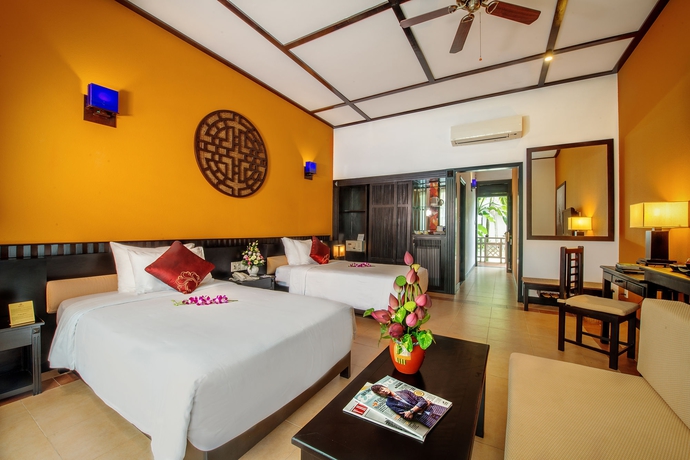Imagen de la habitación del Hotel Hoi An Beach Resort. Foto 7