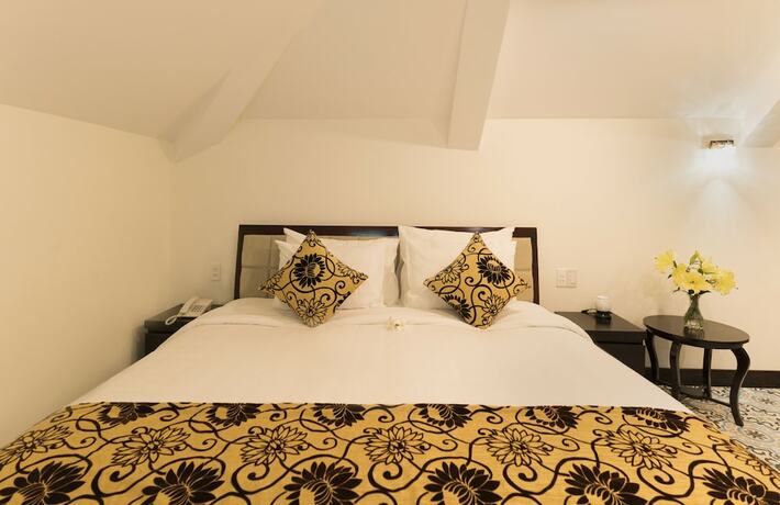 Imagen de la habitación del Hotel Hoi An Canal House. Foto 21