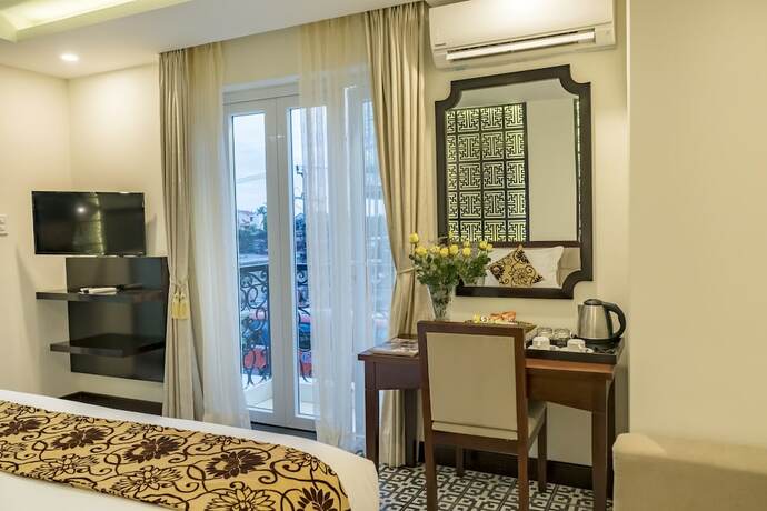 Imagen de la habitación del Hotel Hoi An Canal House. Foto 22