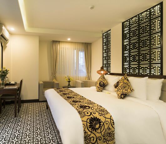 Imagen de la habitación del Hotel Hoi An Canal House. Foto 23