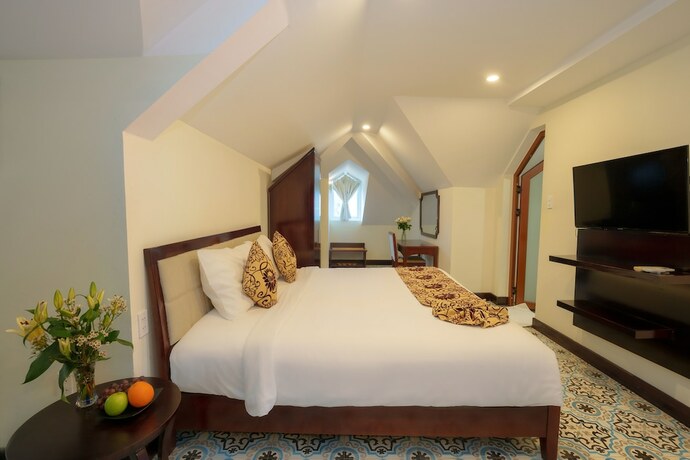 Imagen de la habitación del Hotel Hoi An Canal House. Foto 24