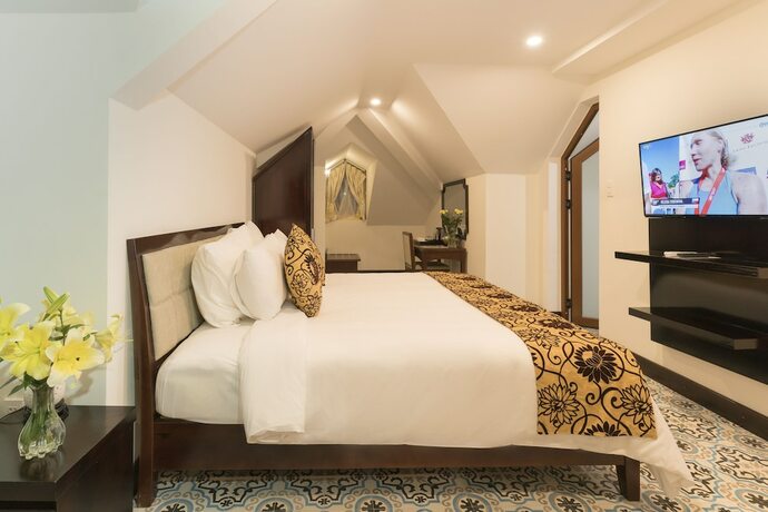 Imagen de la habitación del Hotel Hoi An Canal House. Foto 27