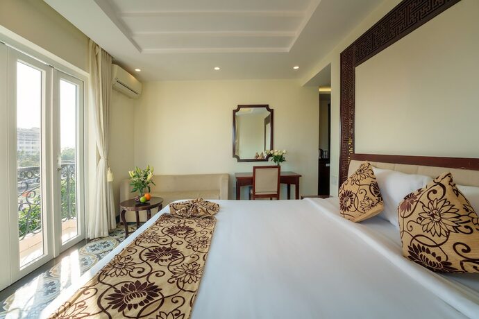 Imagen de la habitación del Hotel Hoi An Canal House. Foto 28