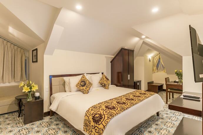 Imagen de la habitación del Hotel Hoi An Canal House. Foto 29