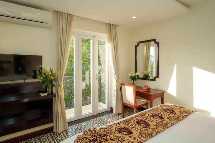 Imagen de la habitación del Hotel Hoi An Canal House. Foto 30