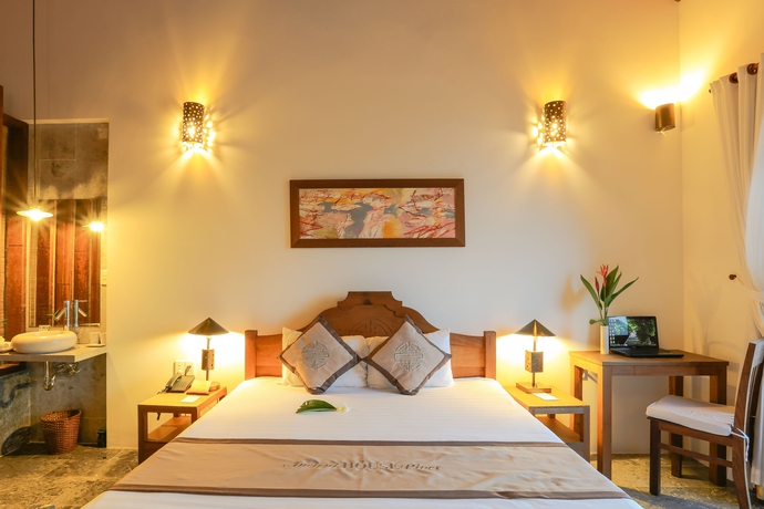 Imagen de la habitación del Hotel Hoi An Coco River Resort and Spa. Foto 5