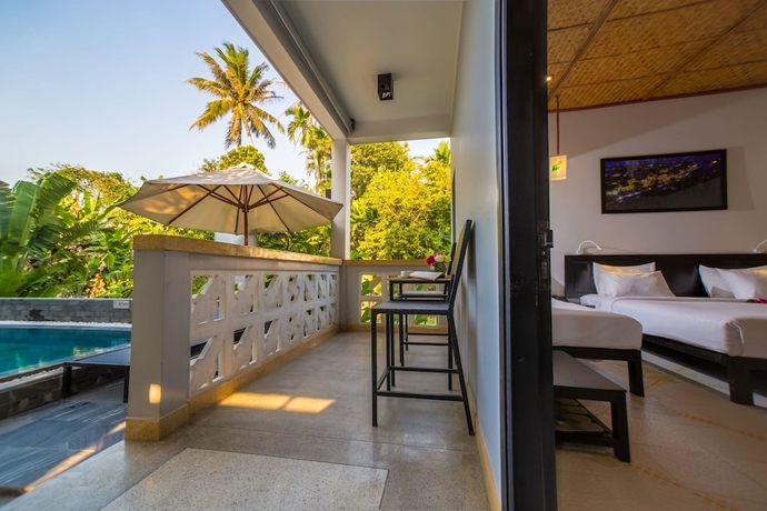 Imagen de la habitación del Hotel Hoi An Corn Riverside Villa. Foto 2