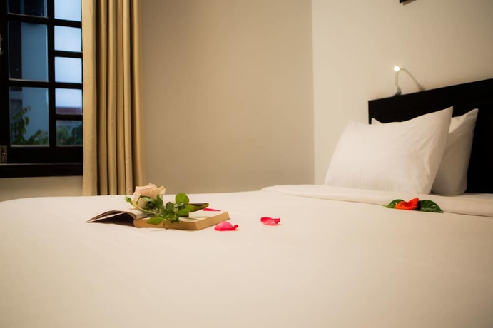 Imagen de la habitación del Hotel Hoi An Corn Riverside Villa. Foto 14