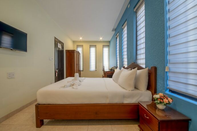 Imagen de la habitación del Hotel Hoi An Golden Heart Villa. Foto 11