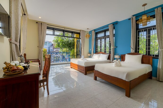 Imagen de la habitación del Hotel Hoi An Golden Heart Villa. Foto 18